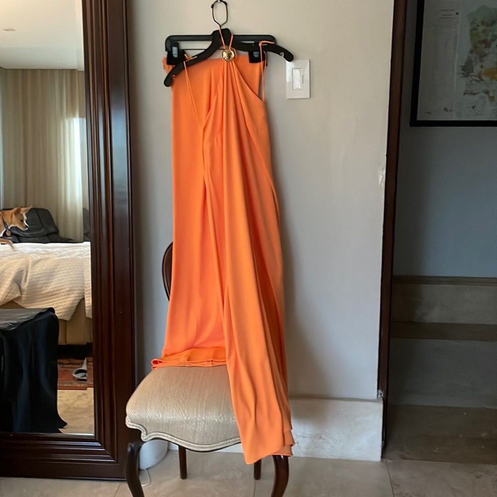 Alexis palazzo pants and long tunic open in the front.